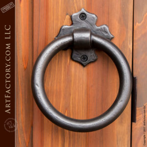 arched solid wood door with custo esutcheon door knocker