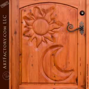 celestial hand carved door with French style lever door pull