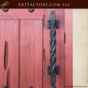 custom castle style door with rugged twisted iron door pull